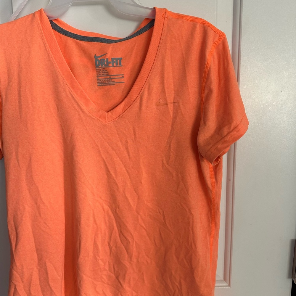 Nike Dri-FIT V-Neck in Vibrant Orange